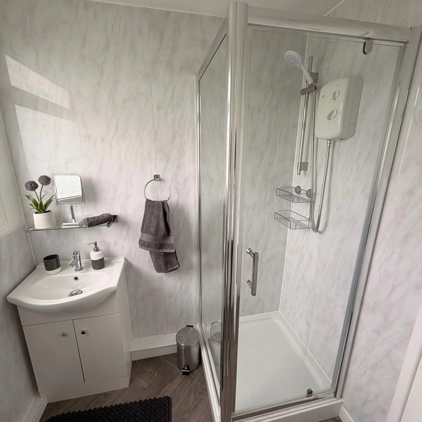 Yaverland Breeze shower room with walk-in shower and basin