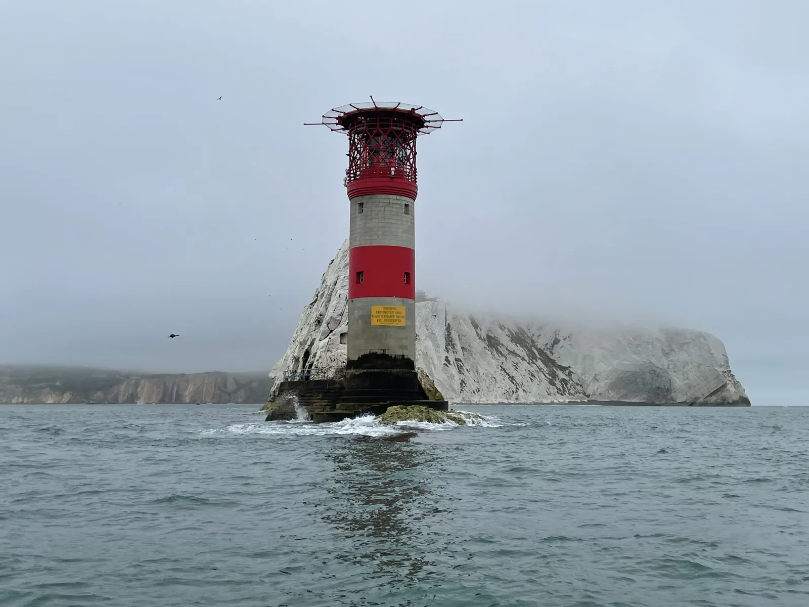 The Needles lighthouse and chalk stacks at the western tip of the Isle of Wight